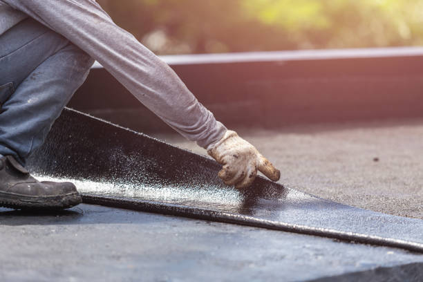 Professional Waterproofing technician working in Logan, OH